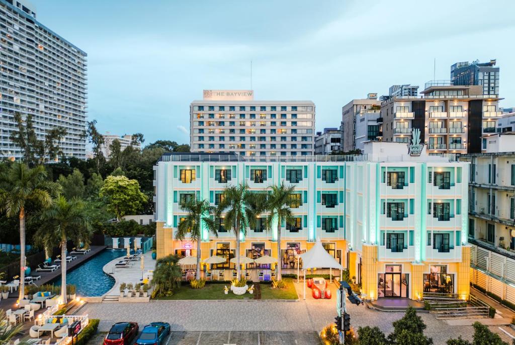 a building in the middle of a city with buildings at Wave Hotel Pattaya in Pattaya