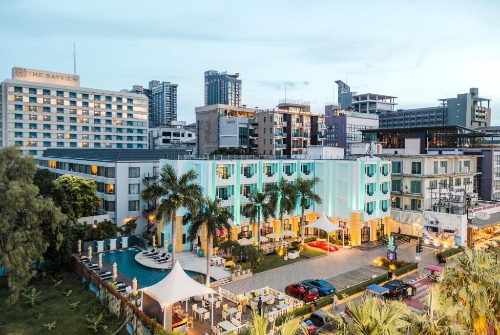 an aerial view of a city with buildings and a pool at Wave Hotel Pattaya in Pattaya