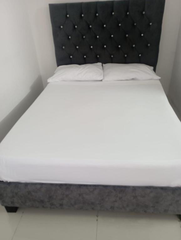 Postel nebo postele na pokoji v ubytování Apartahotel el templete cyc