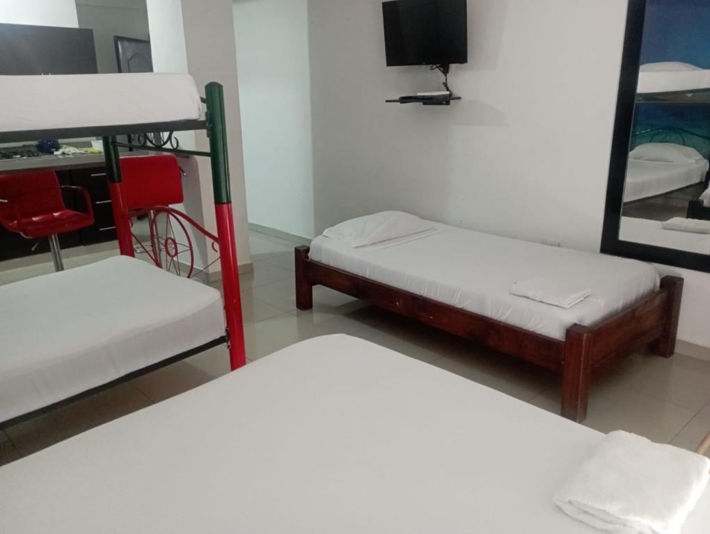 Postel nebo postele na pokoji v ubytování Apartahotel el templete cyc