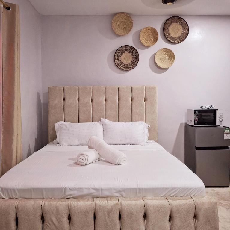 Postel nebo postele na pokoji v ubytování Aura Studio in Diani