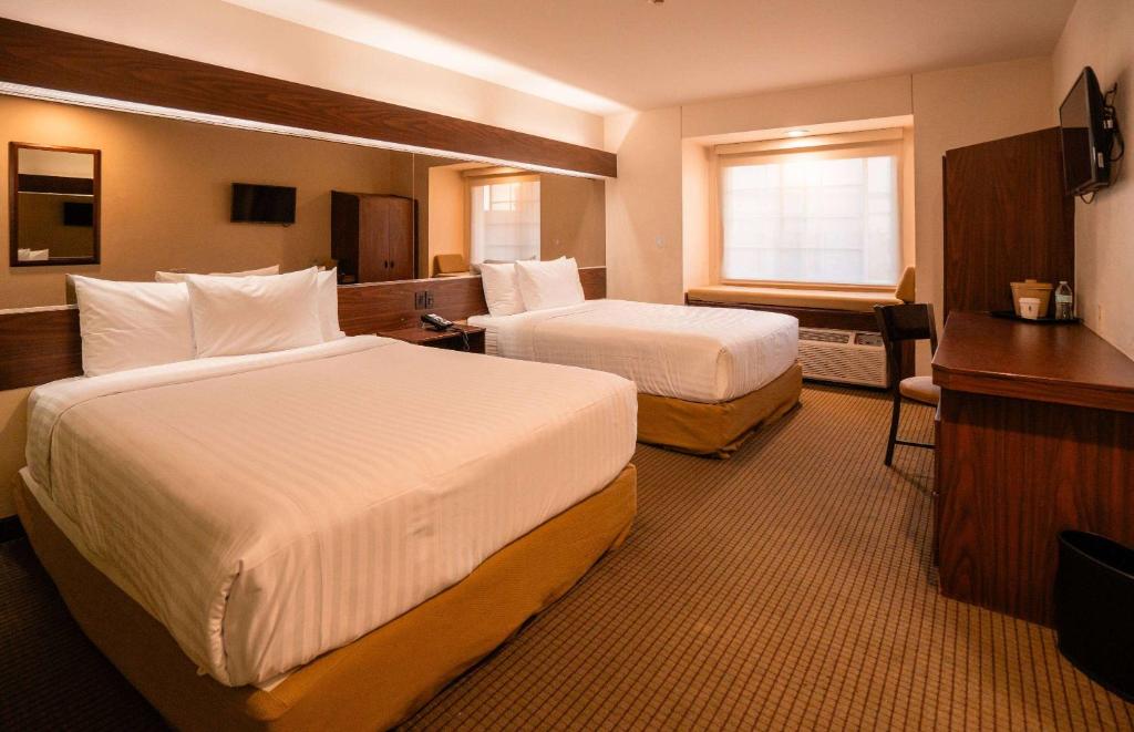 Postel nebo postele na pokoji v ubytování Microtel Inn and Suites by Wyndham Ciudad Juarez, US Consulate