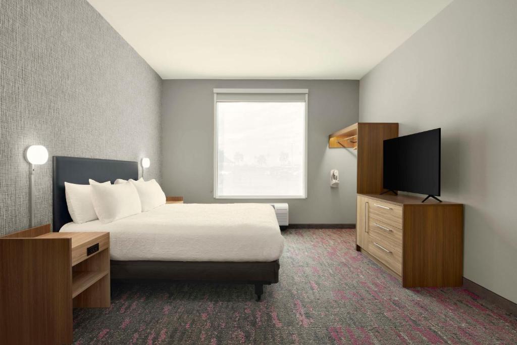 Postel nebo postele na pokoji v ubytování Home2 Suites By Hilton San Juan