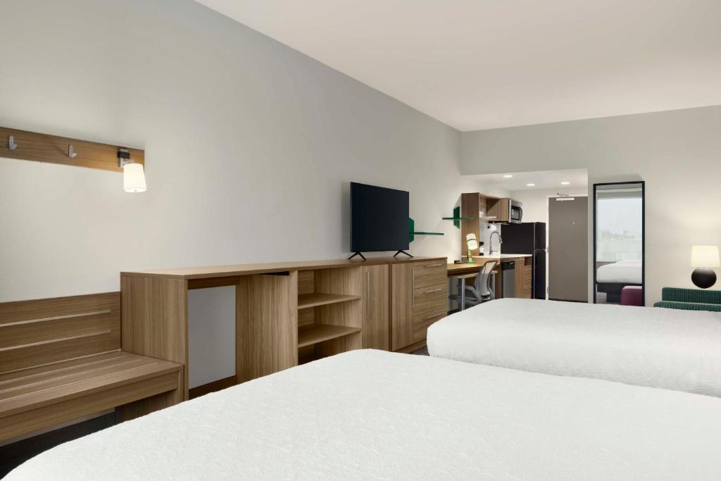 Postel nebo postele na pokoji v ubytování Home2 Suites By Hilton San Juan