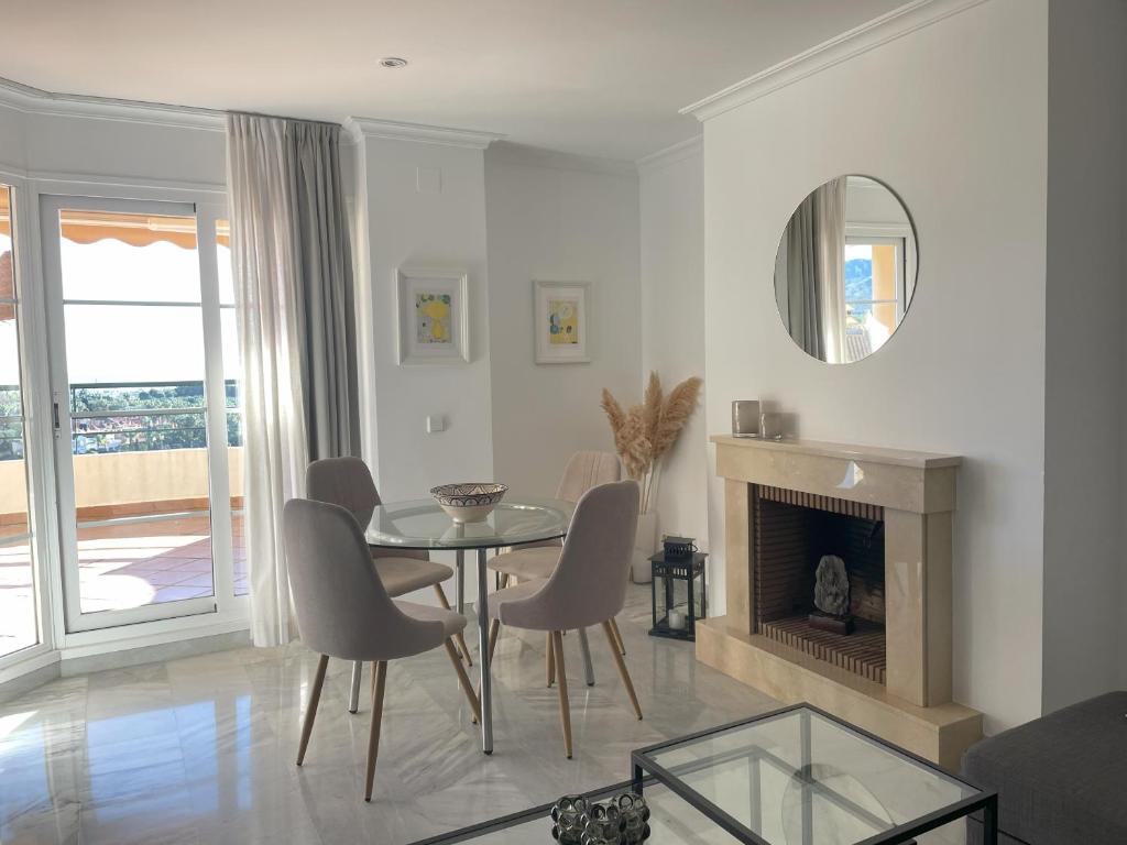 A seating area at Walking distance to Puerto Banus sea view Apartment