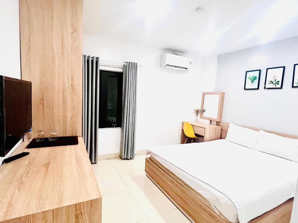 TV a/nebo společenská místnost v ubytování Luna House Hotel