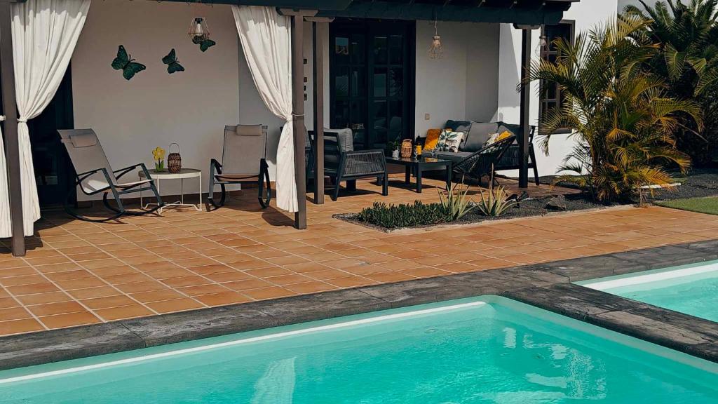 The swimming pool at or close to Casa del Sol Naciente - heated pools - wifi - UK,BE,NL,FR TV channels