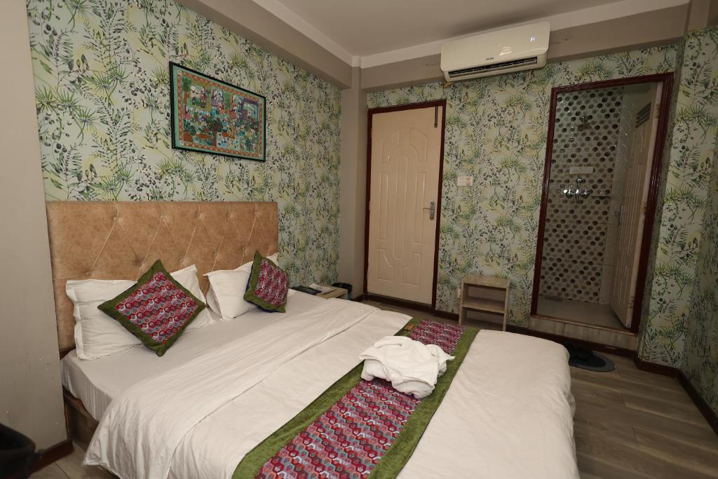 Postel nebo postele na pokoji v ubytování Bed and Pillow Hostel