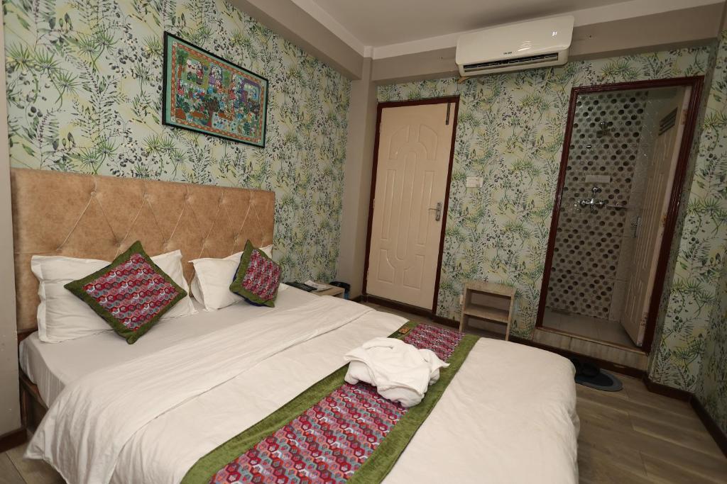 Postel nebo postele na pokoji v ubytování Bed and Pillow Hostel