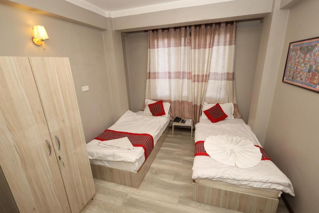 Postel nebo postele na pokoji v ubytování Bed and Pillow Hostel