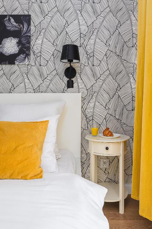 Posteľ alebo postele v izbe v ubytovaní Prymasa Tysiaclecia - P&O Serviced Apartments