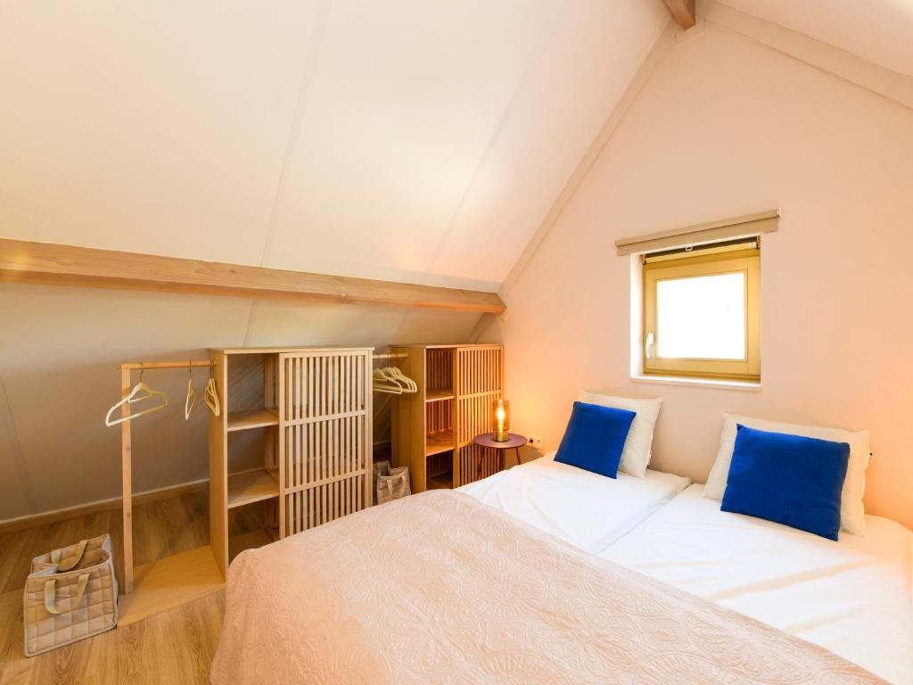 Postel nebo postele na pokoji v ubytování GLOEDNIEUW Vakantiewoning Zilt