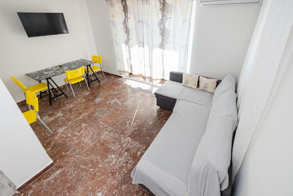 TV a/nebo společenská místnost v ubytování Chris Guesthouses