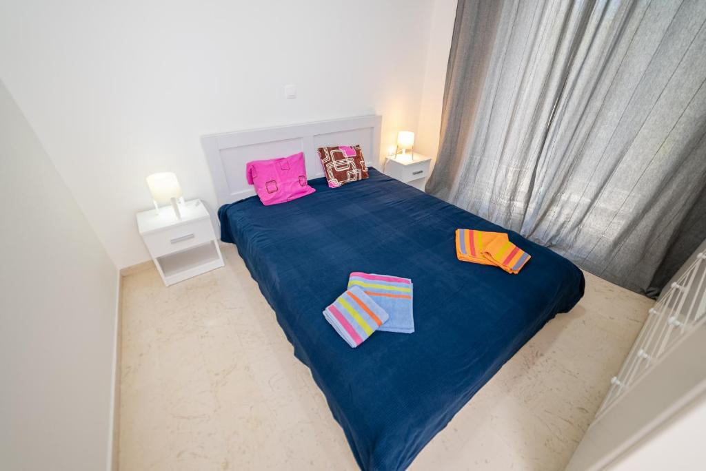 Postel nebo postele na pokoji v ubytování Chris Guesthouses