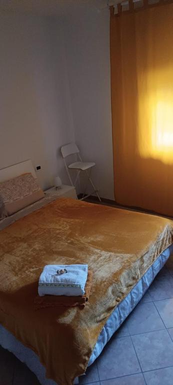 Postel nebo postele na pokoji v ubytování La casetta di Ugo