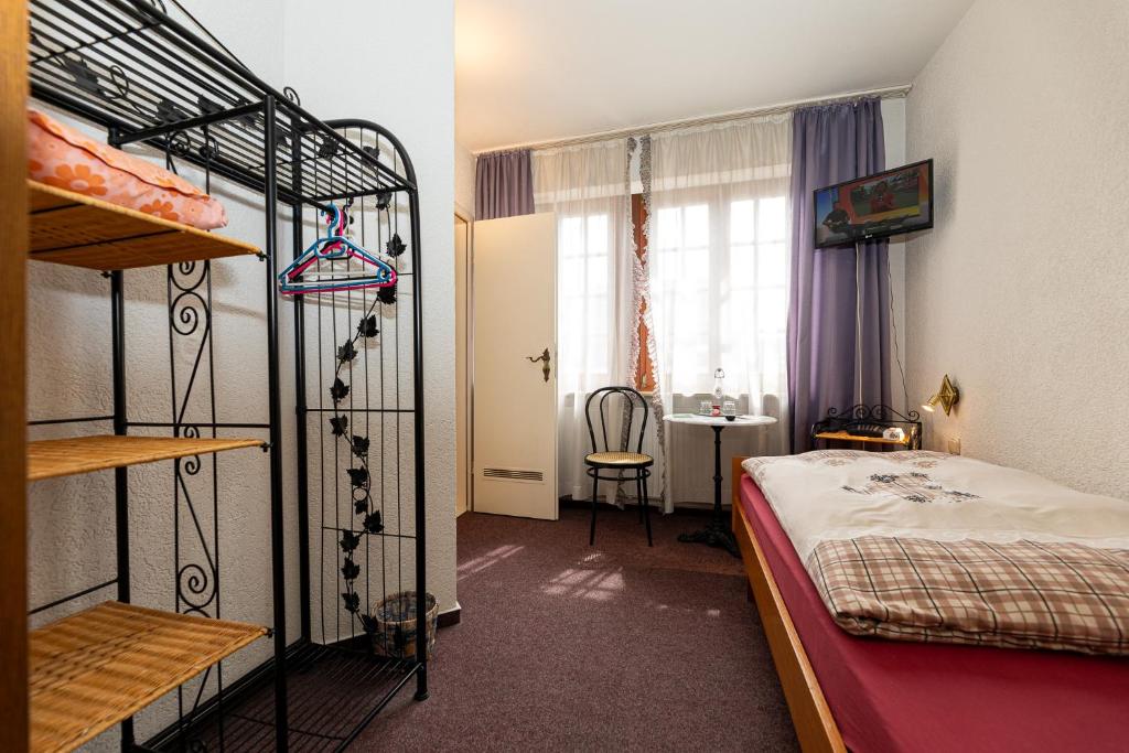 Postel nebo postele na pokoji v ubytování Gästehaus Strieth