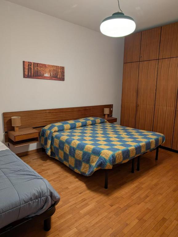 Postel nebo postele na pokoji v ubytování Albergo Spina