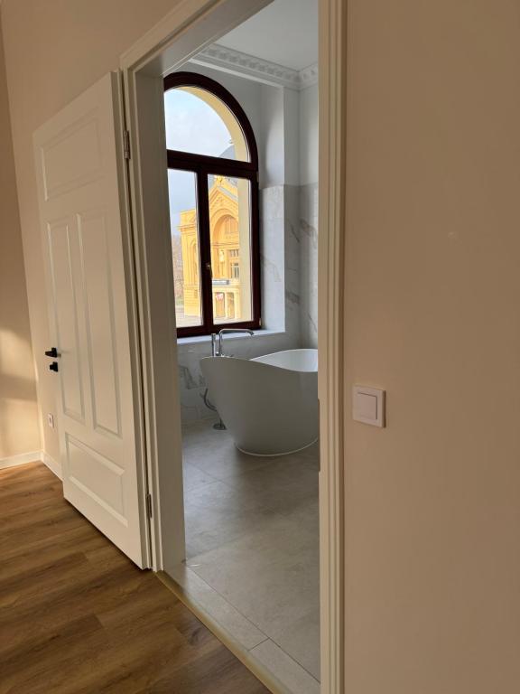 Koupelna v ubytování Promenaden Hotel