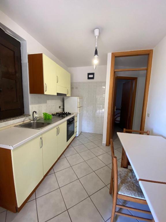 Kuchyň nebo kuchyňský kout v ubytování Residence Punta Cilento
