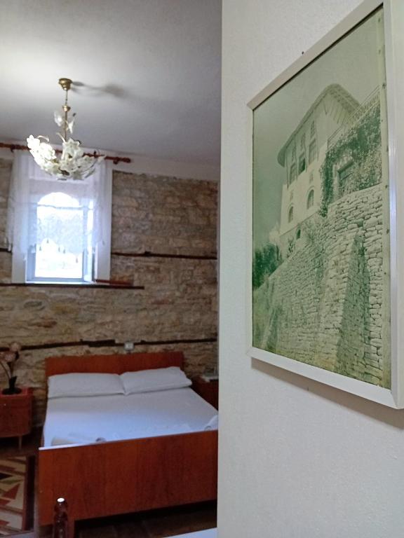 A bed or beds in a room at House H Çela