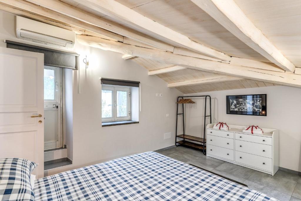 A bed or beds in a room at Circo Massimo Apartment & Terrace