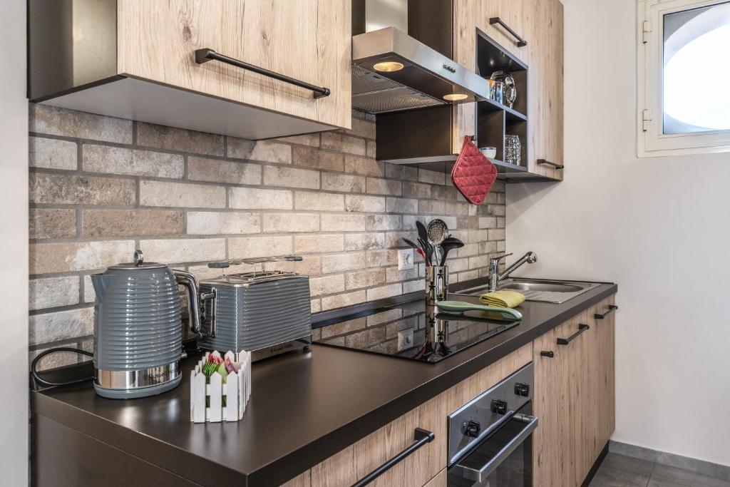 A kitchen or kitchenette at Circo Massimo Apartment & Terrace