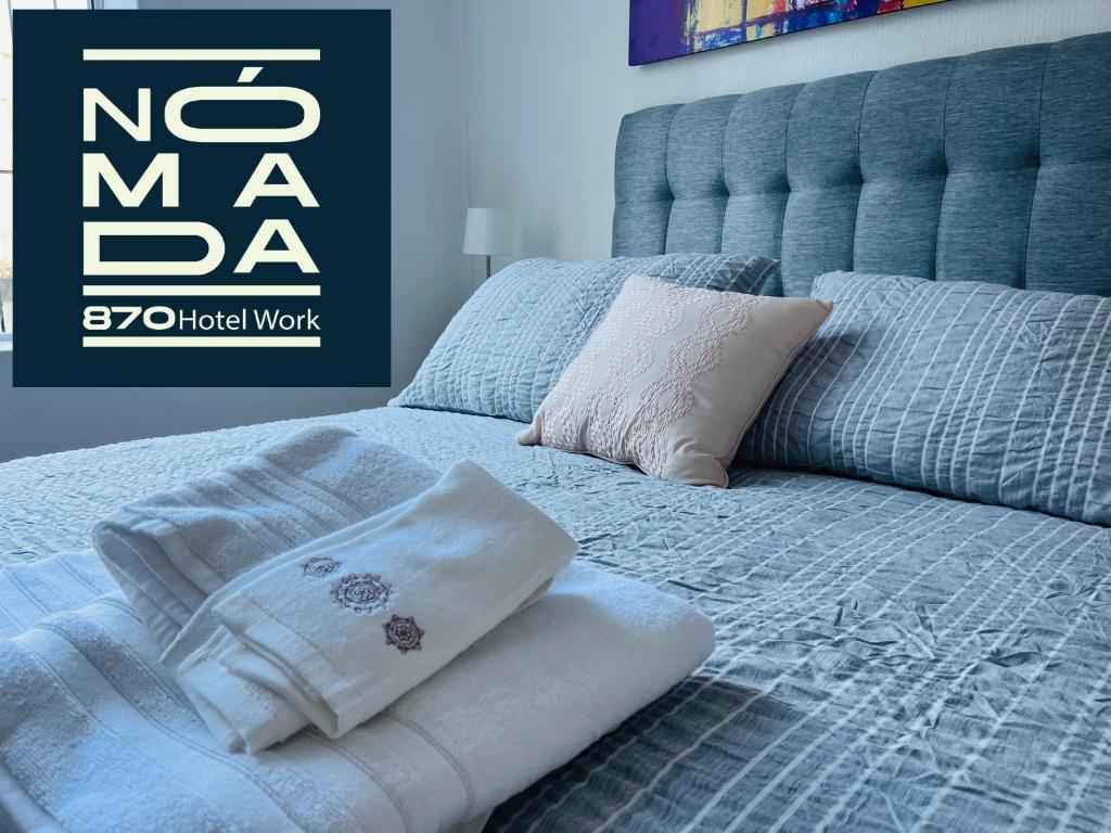 Postel nebo postele na pokoji v ubytování Hotel Nomada Osorno