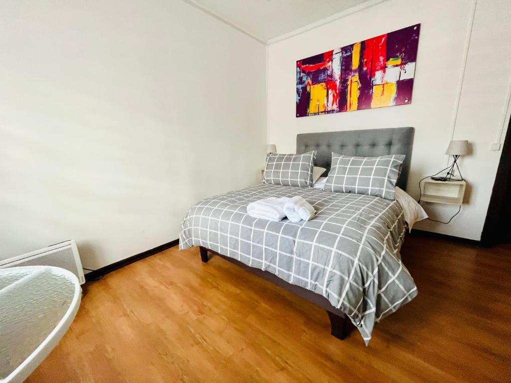 Postel nebo postele na pokoji v ubytování Hotel Nomada Osorno