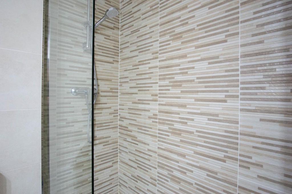 Kúpeľňa v ubytovaní Modern apartment with a wonderful sea view