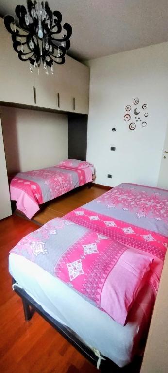 Posteľ alebo postele v izbe v ubytovaní Casa Cristina