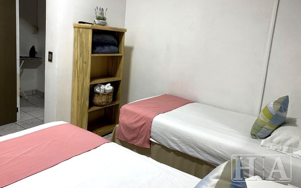 Postel nebo postele na pokoji v ubytování Hospedaje Aldana - Apartamento AMAL zona centro