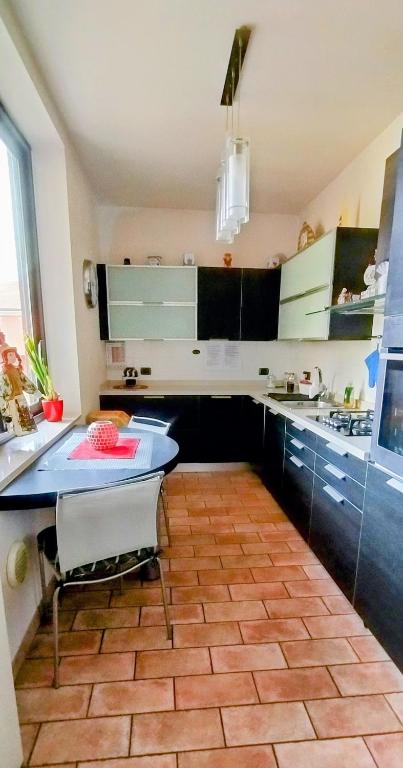 Kuchyňa alebo kuchynka v ubytovaní Casa Cristina