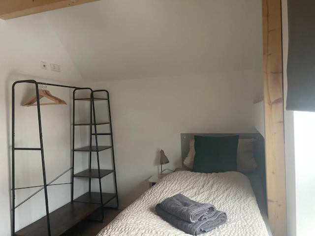 Postel nebo postele na pokoji v ubytování FREIGEIST Rooms