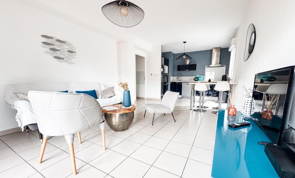 Kuchyňa alebo kuchynka v ubytovaní Bel appartement climatisé & parking