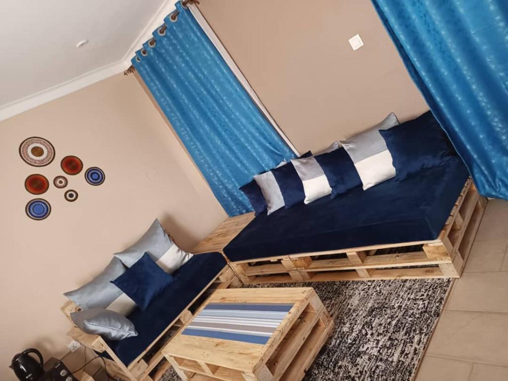 Postel nebo postele na pokoji v ubytování Talma Home
