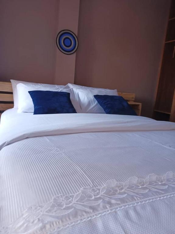 Postel nebo postele na pokoji v ubytování Talma Home