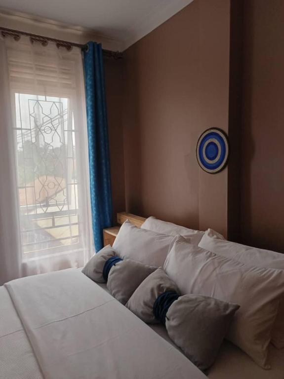 Postel nebo postele na pokoji v ubytování Talma Home