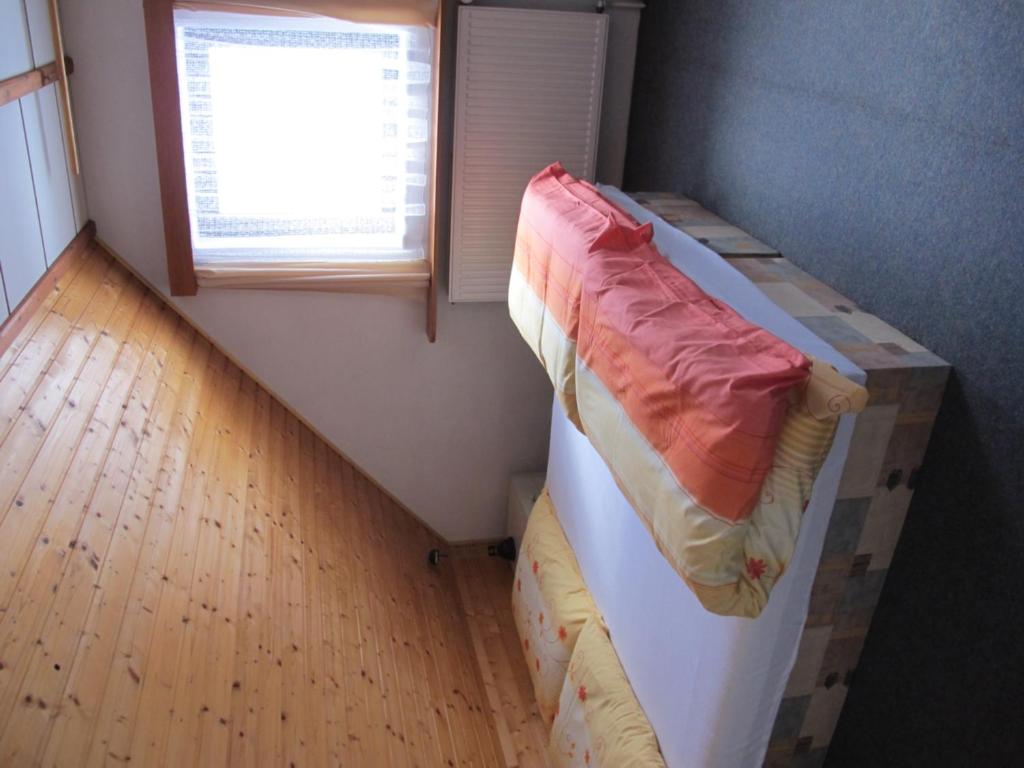 Postel nebo postele na pokoji v ubytování Guest House U Lakomce