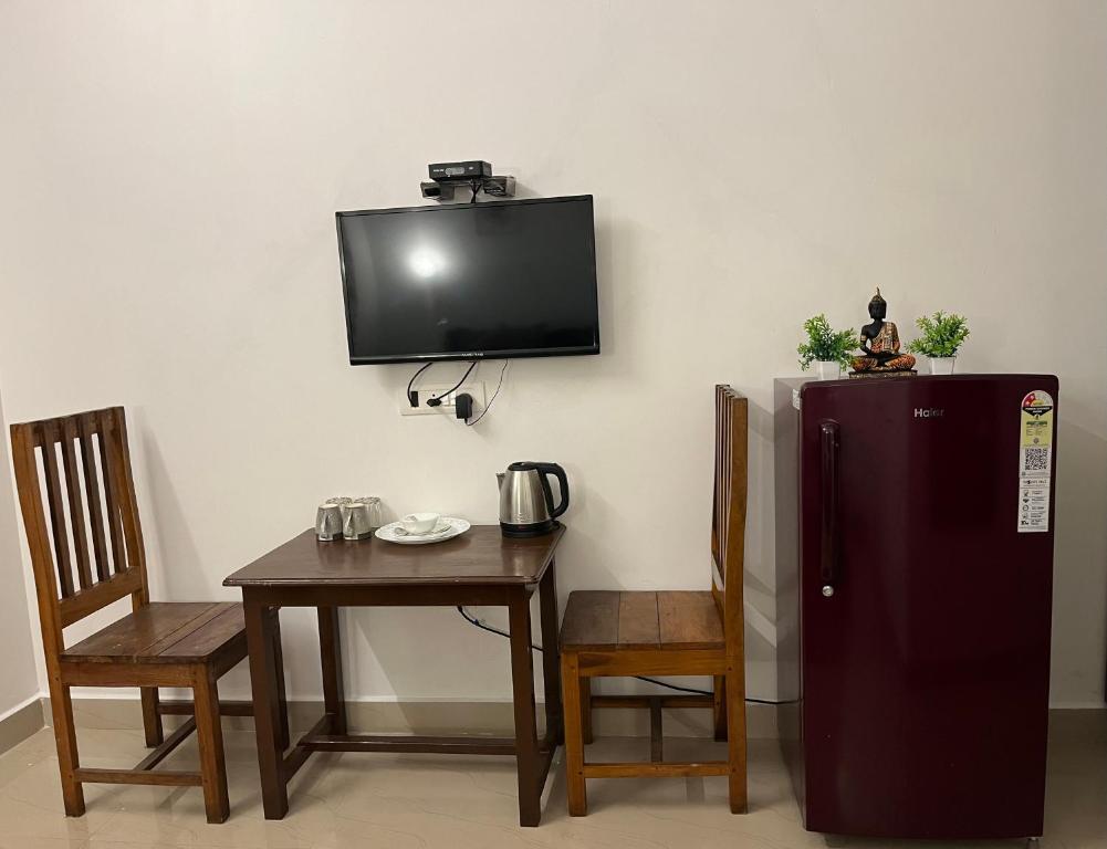 TV a/nebo společenská místnost v ubytování Palm paradise anjuna