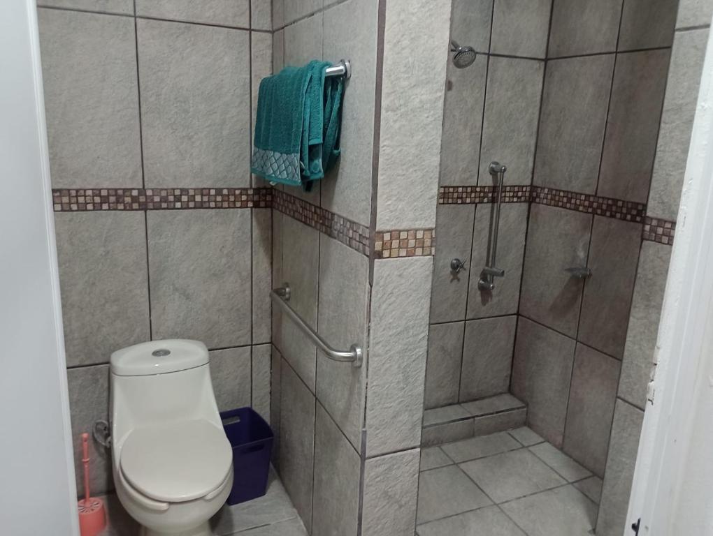 Koupelna v ubytování Departamento el REPOSO