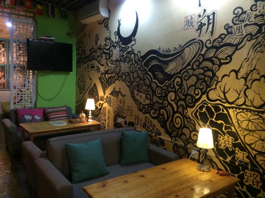 Posezení v ubytování Yangshuo How Flowers Hostel