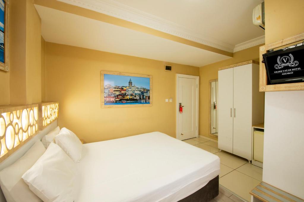 Postel nebo postele na pokoji v ubytování GRAND VATAN HOTEL