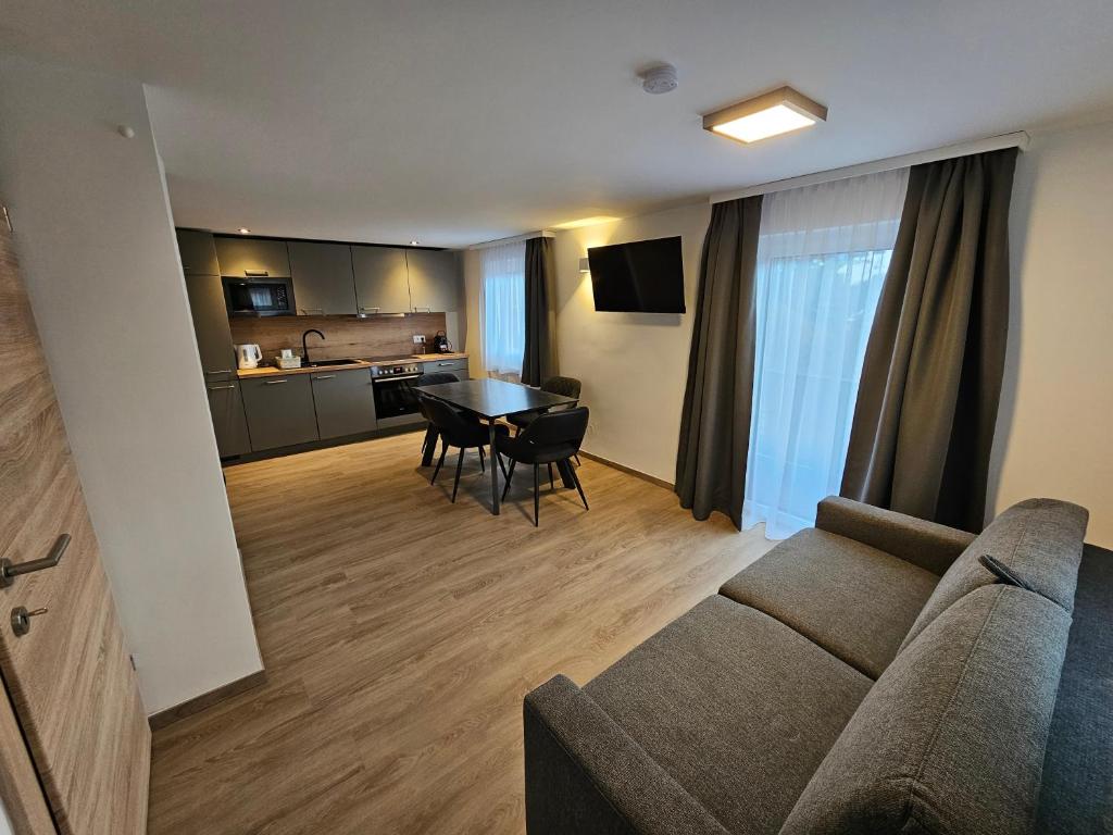 Televízia a/alebo spoločenská miestnosť v ubytovaní New, cozy retreat, 300 m to ski bus in Schladming Region