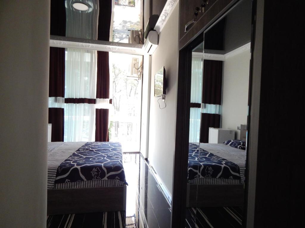Postel nebo postele na pokoji v ubytování Guesthouse Agmashenebeli Sea side