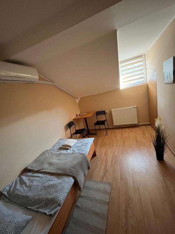Postel nebo postele na pokoji v ubytování Sobe Zoka