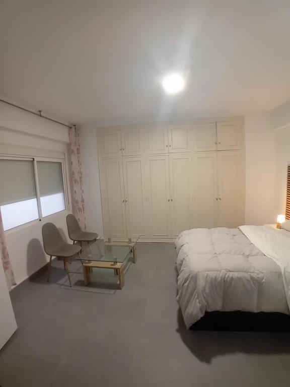 Postel nebo postele na pokoji v ubytování Casa Blanca 48