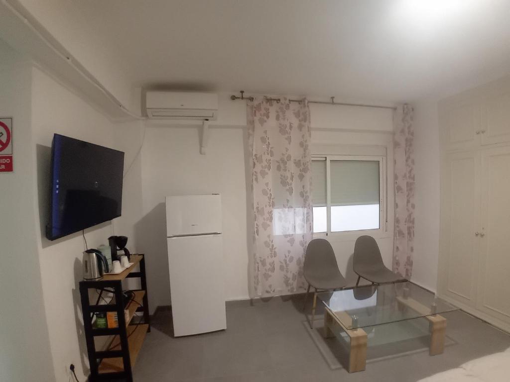TV a/nebo společenská místnost v ubytování Casa Blanca 48