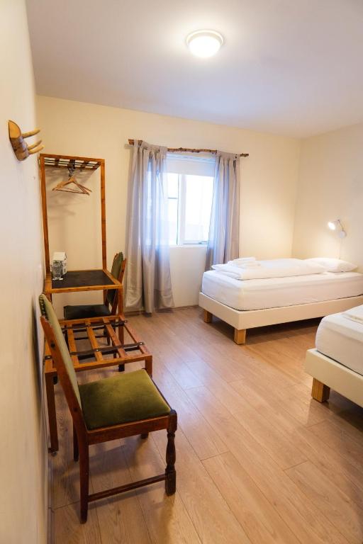 Hotel Studlagil房間的床