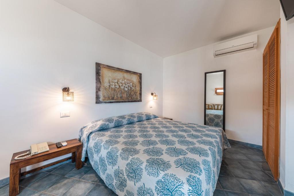 Postel nebo postele na pokoji v ubytování Hotel Lido Torre Egnazia