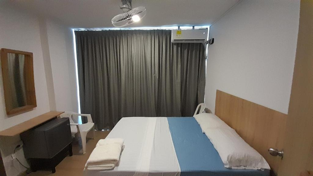 Cama o camas de una habitación en Panamerican Hostel